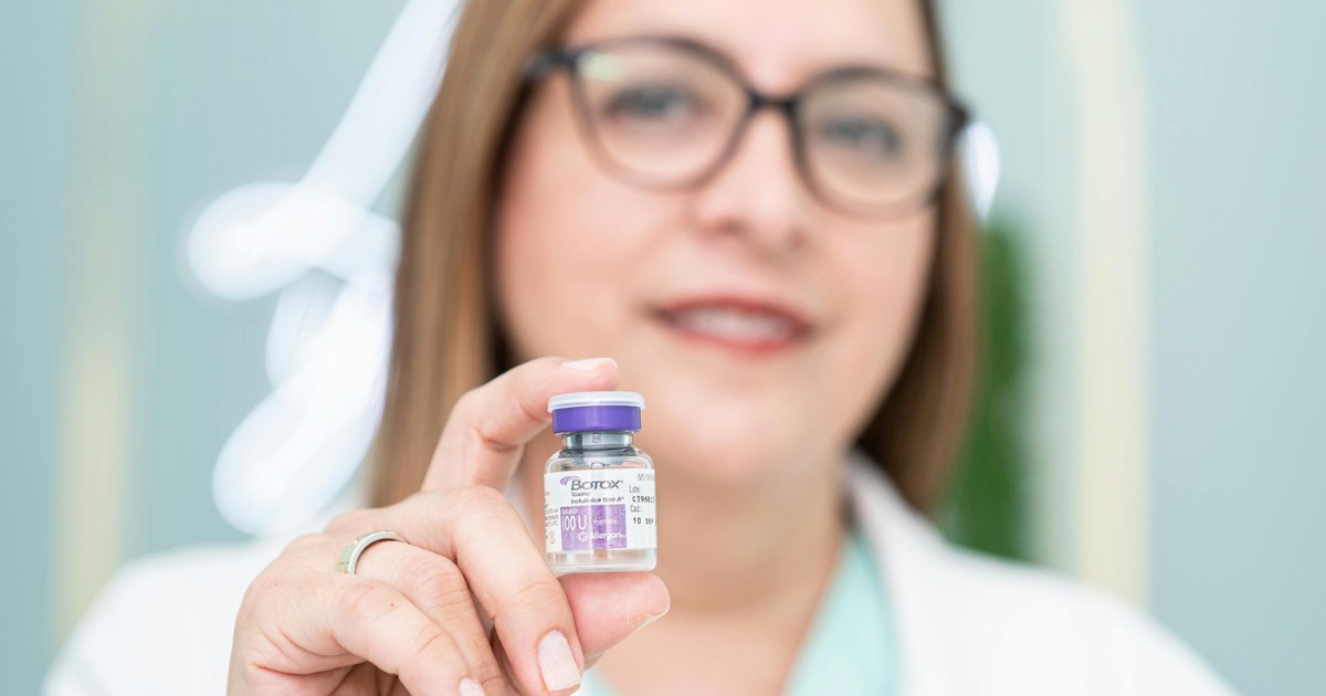 a provider holding a vial of Botox